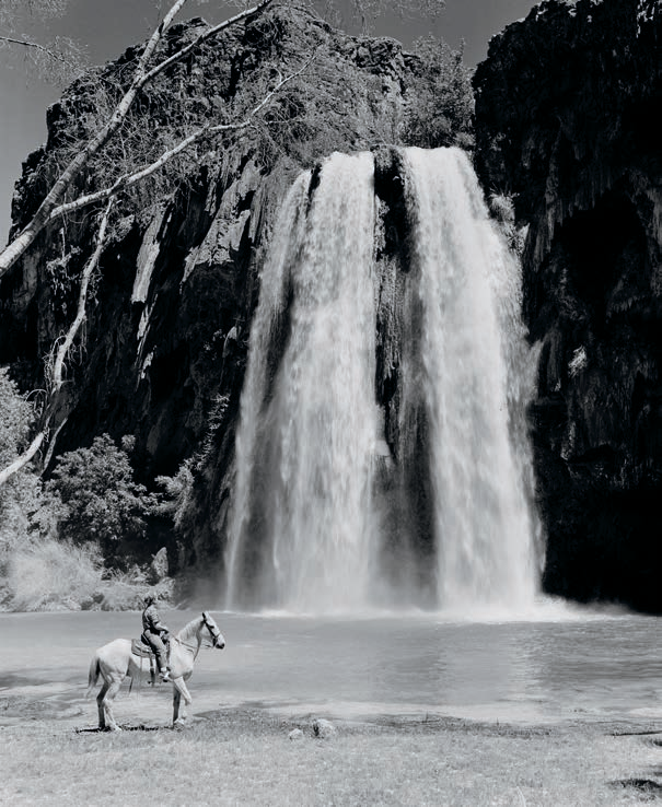In another photo by Josef, Joyce admires Havasu Falls, near the Havasupai village of Supai, while on horseback. NORTHERN ARIZONA UNIVERSITY CLINE LIBRARY
