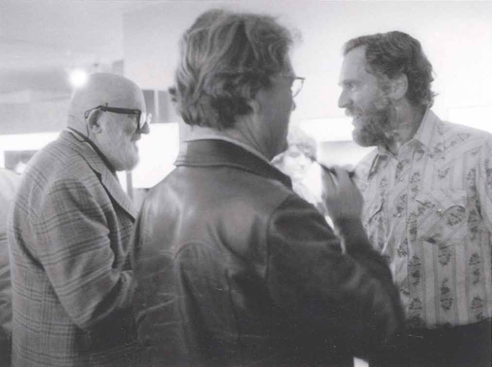 (from left) Ansel Adams, Brett Weston and David Muench talk shop in the early 1980s.