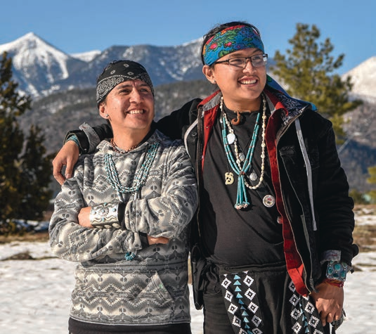 Darrell Marks (left) and his son Makaius, shown in front of the Peaks, have played key roles in the effort to rename Agassiz Peak as Oomàwki, a Hopi word meaning “home of the clouds.” | Chloe Legay/The Lumberjack