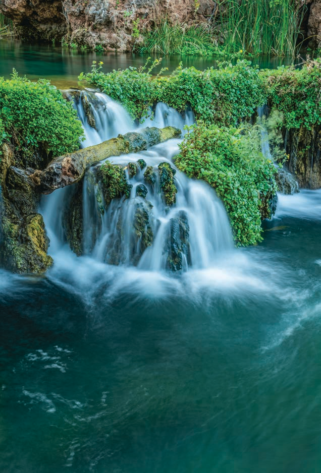 Spring-fed Fossil Creek tumbles over travertine dams and waterfalls amid the greenery of the Fossil Springs Wilderness, near Strawberry. The springs that feed Fossil Creek flow at a rate of about 20,000 gallons per minute, making this area a haven for both wildlife and backpackers. | Laurence Parent | SONY ALPHA 7R II, 2 SEC, F/16, ISO 50, 35 MM LEN