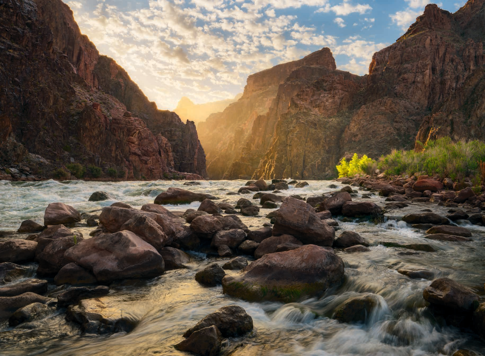 The light of a new day streams through a gap in the dark walls of the Canyon’s Inner Gorge. This view is looking upstream from Granite Rapid, at Mile 94 of the Colorado River’s 277-mile course through the Canyon FUJIFILM GFX100S, 1/40 SEC, F/16, ISO 100, 29.1 MM LENS