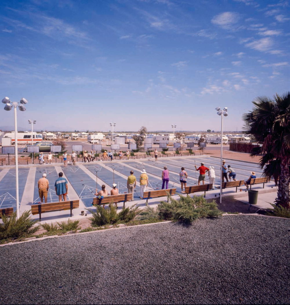 Residents of Road Runner Trailer Park, on Salt River Pima-Maricopa Indian Community land near Scottsdale, play shuffleboard on the park’s courts. Later known as Roadrunner Lake Resort, the senior community opened in 1969 and closed in 2019.