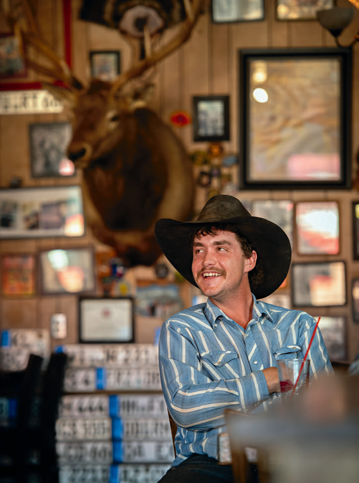 Seligman resident Devon Wingard enjoys a cold beverage at Westside Lilo’s Café.