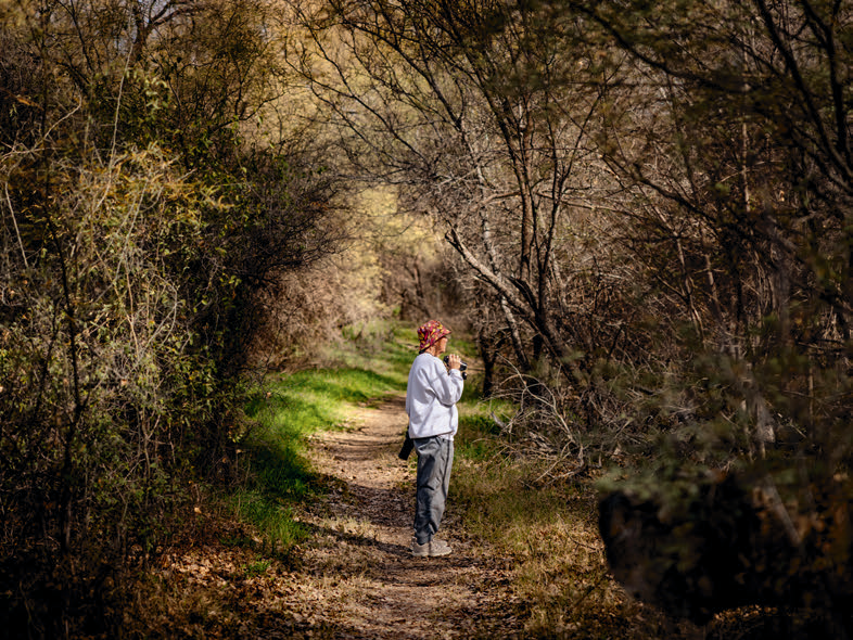 Birder Judy Ellyson, of Green Valley, hikes the Juan Bautista de Anza National Historic Trail, which runs along the Santa Cruz River in Tubac.