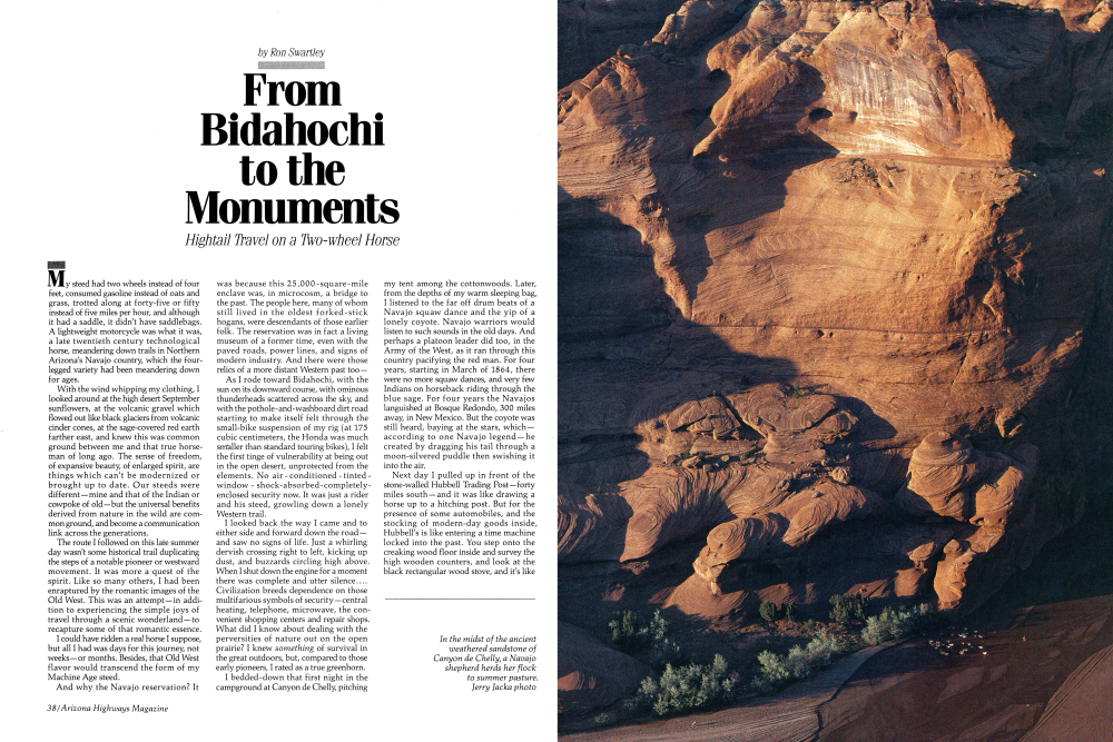 In the midst of the ancient weathered sandstone of Canyon de Chelly, a Navajo shepherd herds her flock to summer pasture.