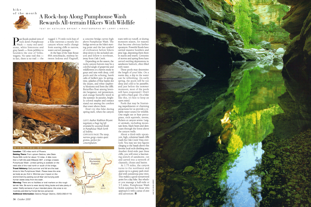 Author Kathleen Bryant negotiates a huge log left stranded by seasonal floods in Pumphouse Wash north of Sedona.