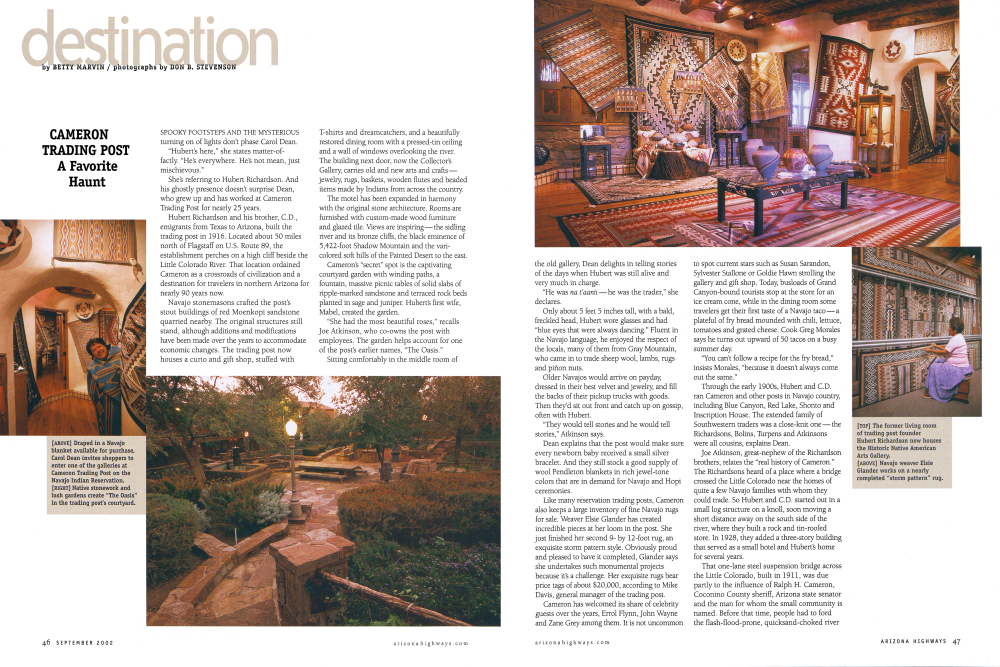 Draped in a Navajo blanket available for purchase, Carol Dean invites shoppers to enter one of the galleries at Cameron Trading Post on the Navajo Indian Reservation.