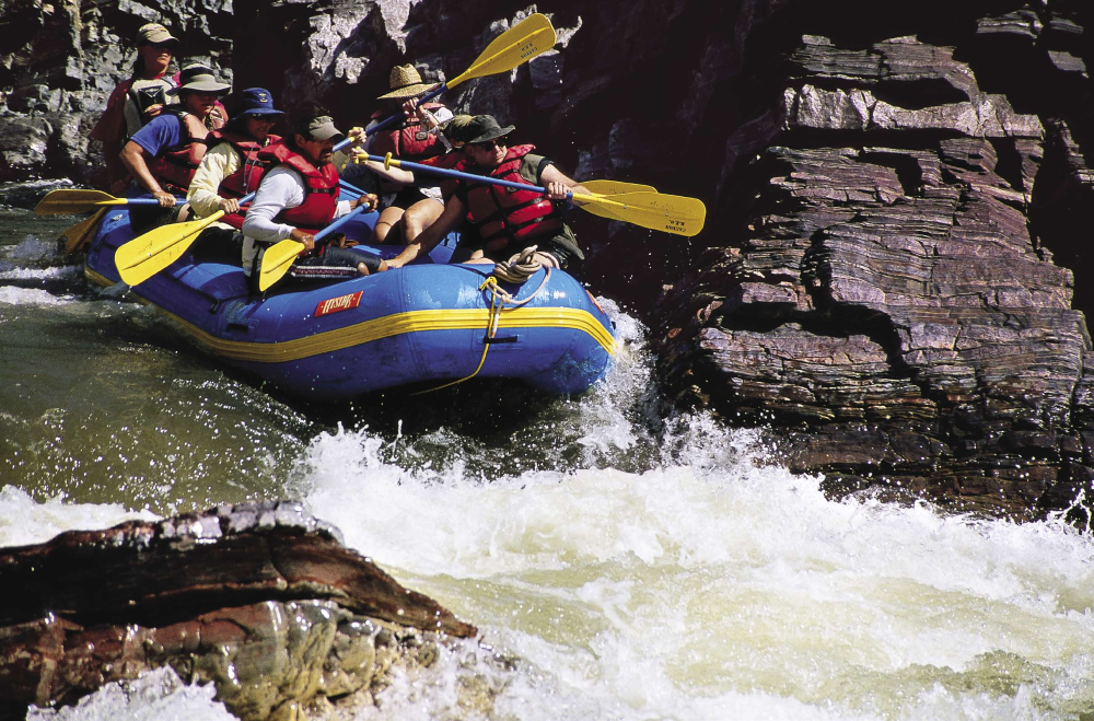 Rafters get a sweet taste of the Salt River as it pulses through the crooked narrows of Quartzite Falls rapid at an approximate rate of 2,500 cubic feet of water per second, a.k.a. the "love level."