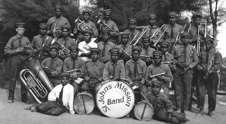 Students of St. John's Indian School on the Gila Indian Reservation formed the St. John's Mission Band, photographed by Father Schwarz in 1921.
