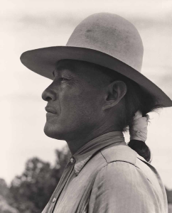 Luke Yazzie (right) appears in profile in Pine Springs, Arizona, in 1952.