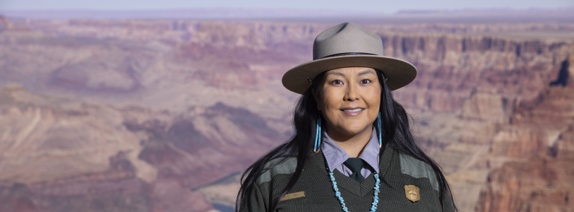 Kelli Jones, a member of the Navajo Nation, is pictured at Desert View, the part of Grand Canyon National Park where she works as an interpretive ranger. In some ways, she says, Indigenous people remain excluded from conversations about the Canyon’s history.