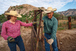 The Kings mend a fence at their 55,000-acre ranch, which dates
to 1895 and now is a Red Angus cow-calf operation.
DAVID WALLACE