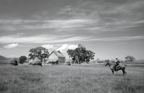 This barn, windmill and farmhouse were constructed for the filming of Oklahoma! in the San Rafael Valley. The Santa Cruz River runs past the site.