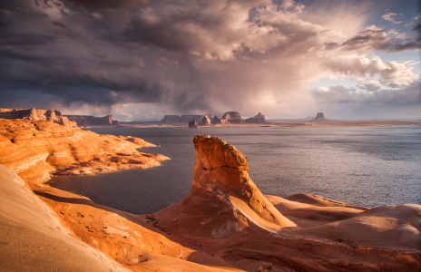 An afternoon thunderstorm looms over Lake Powell's Padre Bay. When full, the lake is 186 miles long and has nearly 2,000 miles of shoreline.