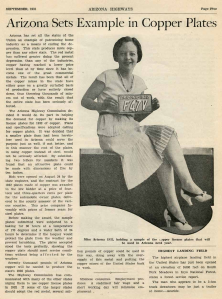 Miss Arizona 1932, holding a sample of the copper license plates that will be used in Arizona next year.