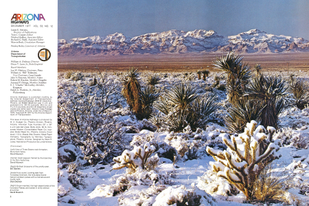 Snow-mantled, the high desert lands of the Colorado Plateau are locked in chilly silence at sunrise.